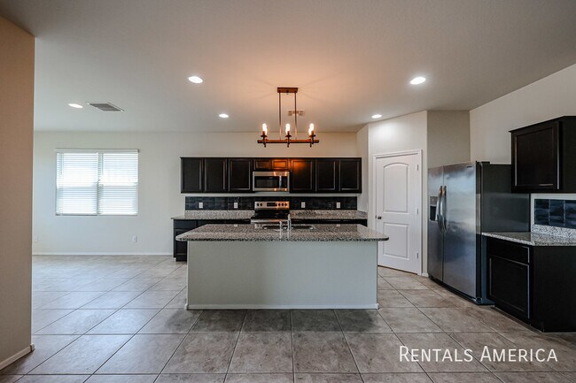 Building Photo - 37682 W Amalfi Ave