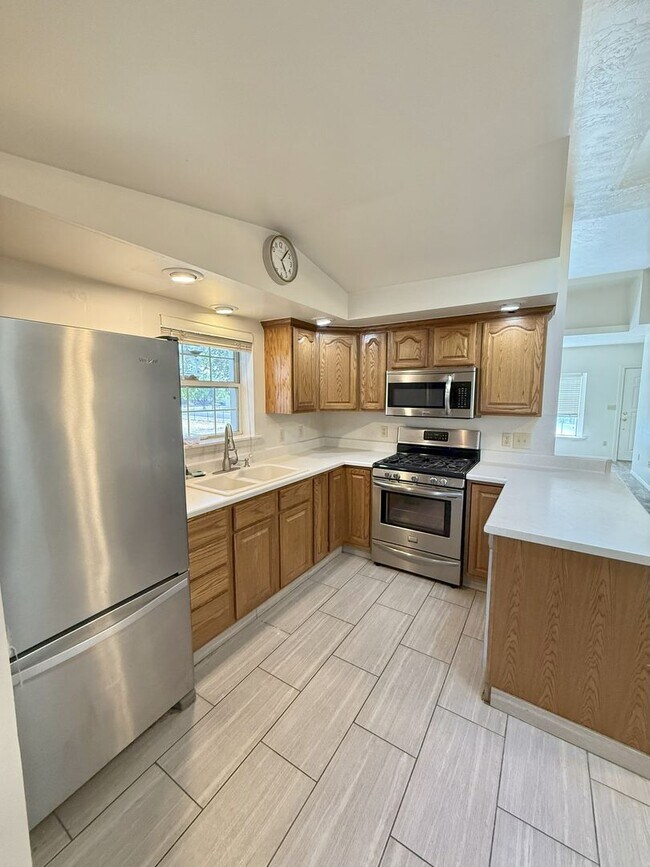 Building Photo - Timeless Charm, Modern Living — 4-Bed Gem ...
