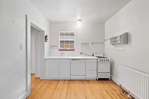 Foto del edificio - Charming 1-Bedroom Apartment in Desirable ...