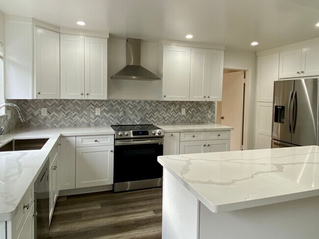 Building Photo - Spacious and remodeled 4 Bedroom, 2.5 Bath...