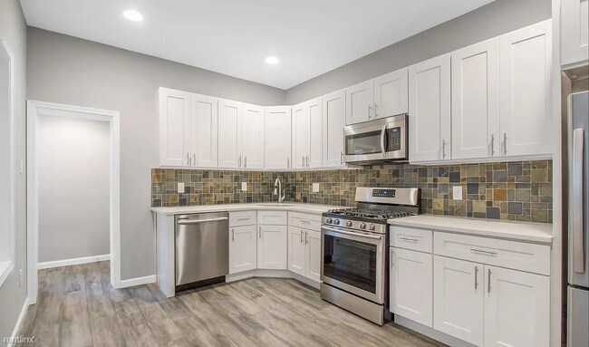 Foto del edificio - 3 br, 1.5 bath Townhome - 1628 North Dover...