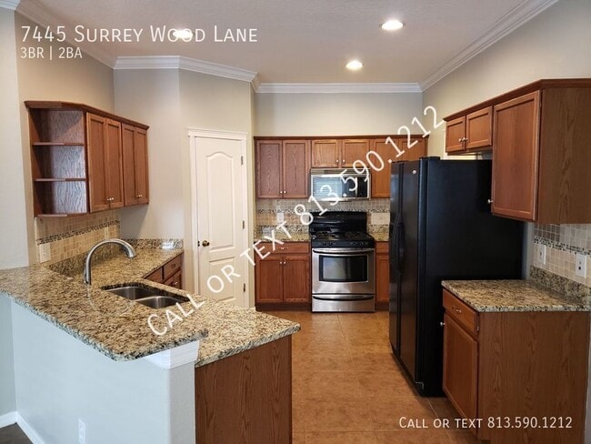 Building Photo - 7445 Surrey Wood Ln