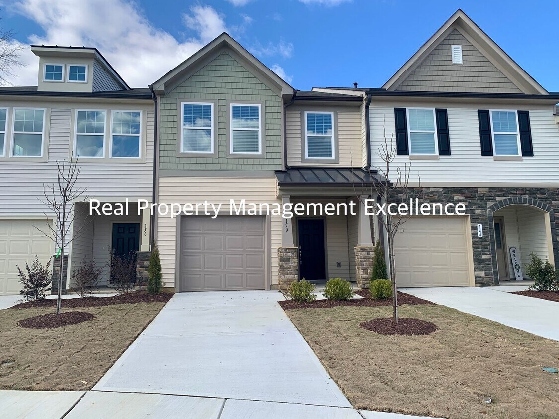 Primary Photo - LUXURIOUS BRAND NEW TOWNHOME In Clayton, A...