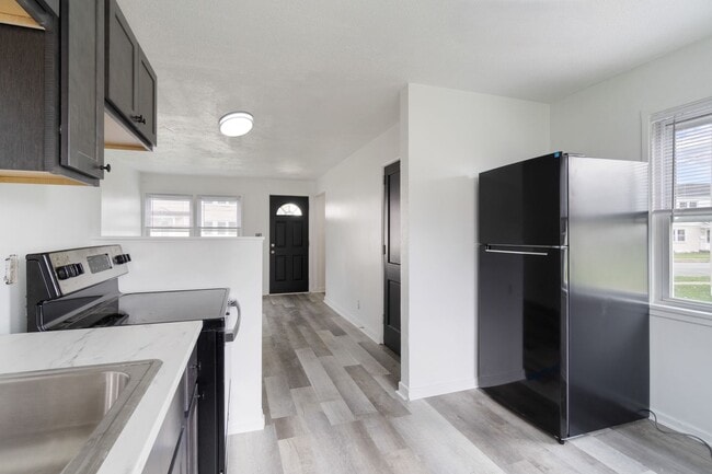 Building Photo - Available in June! 4-Bedroom Townhouse in Scenic Hills Homes - Midland, PA