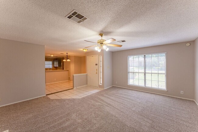 Building Photo - Charming Sunlit 3-Bedroom Home with Spacio...