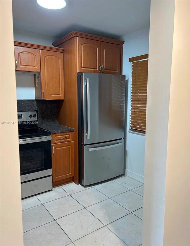 Foto del edificio - 8720 N Sherman Cir