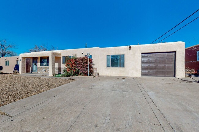 Building Photo - NE PUEBLO STYLE 3 Bedroom 2 Bath 1824/SF