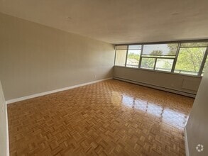 Building Photo - 1061 Queen's Blvd