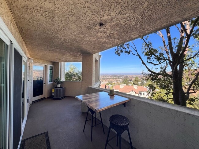 Building Photo - DOUBLE CAR GARAGE! AC! LARGE PATIO BALCONY...