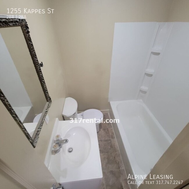 Building Photo - West Indy 2BR/2BA House w/Garage!