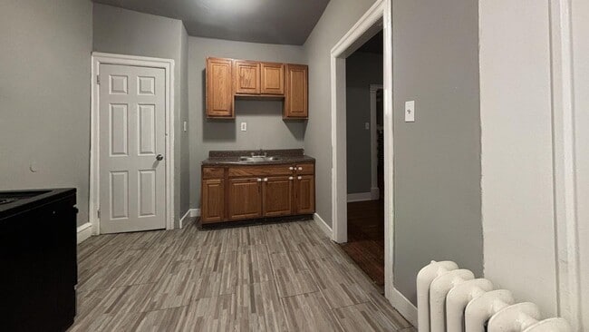 Building Photo - Nice Home with Hardwood Floors