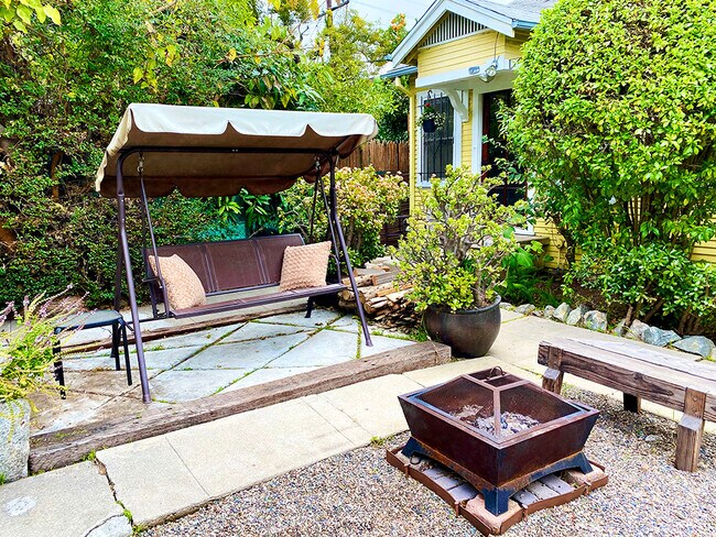 Front of guesthouse + (shared) swing - 5714 Virginia Ave