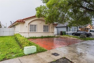 Building Photo - 7553 W 4th Ct