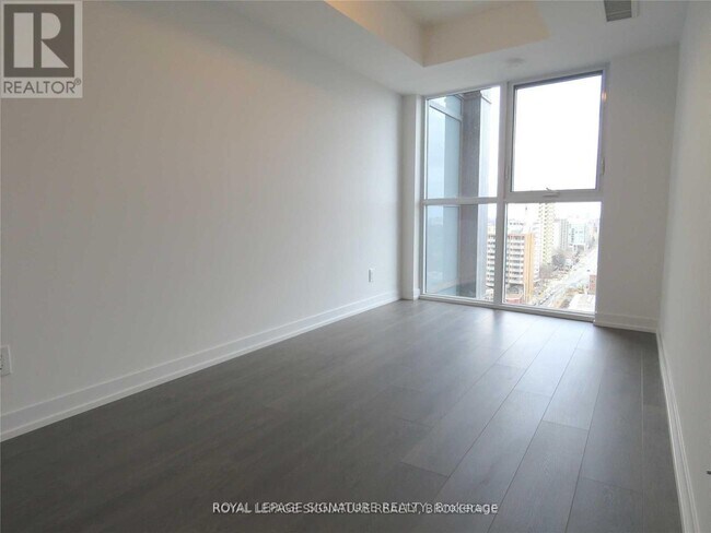 Photo du bâtiment - 125-2125 Redpath Ave