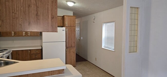 Building Photo - In Town Convenience