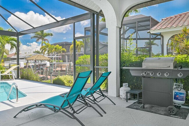 Building Photo - NOW AVAILABLE - Waterfront Pool Home w/ Bo...