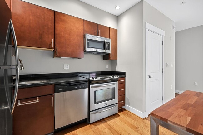 Building Photo - Chic 1-Bedroom Condo in Columbia Heights – Steps from Metro, Parks & Cafés
