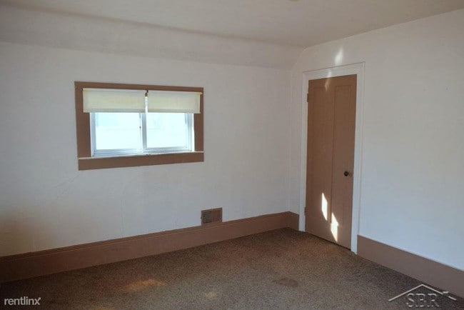 Building Photo - 4 br, 1.5 bath House - 311 N Granger St