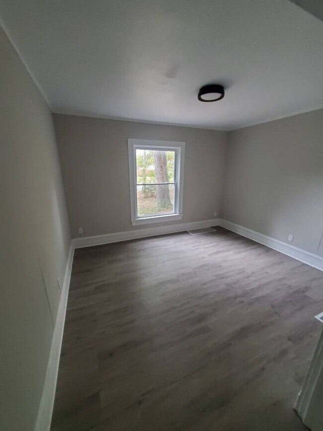 Foto del edificio - Charming 4-Bedroom Property in Prime Location