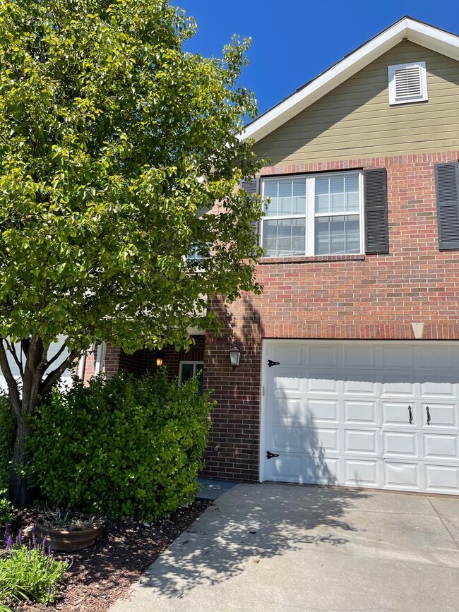 Building Photo - CLOSE TO FORT RILEY, FENCED BACKYARD!