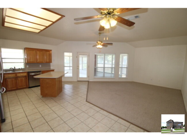 Building Photo - Soak up the sun in the sunroom with a SPEC...