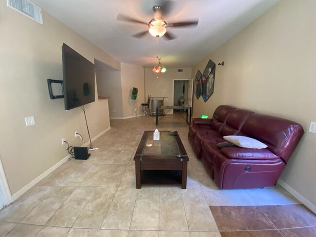 Building Photo - First Floor Unit with 2 Car Garage with Di...