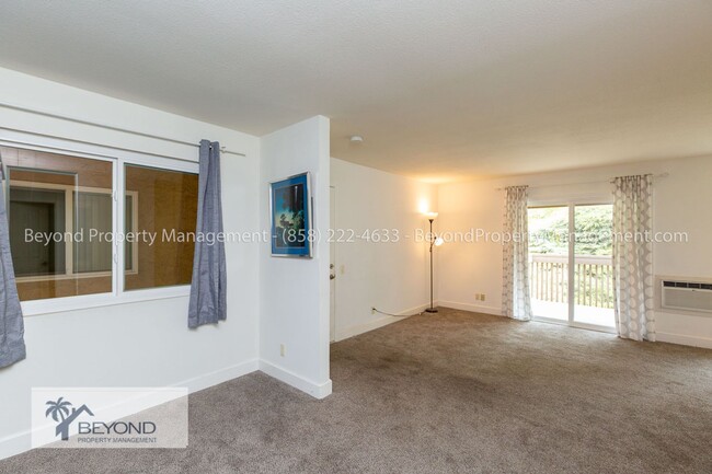 Building Photo - CHARMING JUNIOR 1-BEDROOM END UNIT IN HIGH...