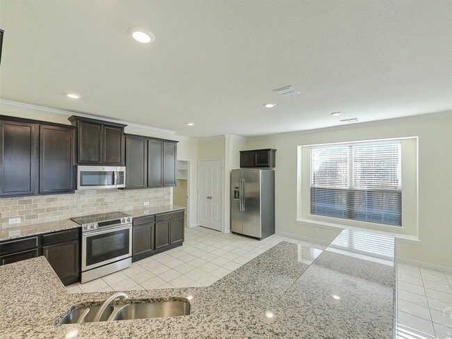 Foto del edificio - 11605 Champion Creek Dr
