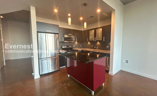 Building Photo - Modern 1-Bedroom Condo with City Views in Prime Nashville Location / Available Now!