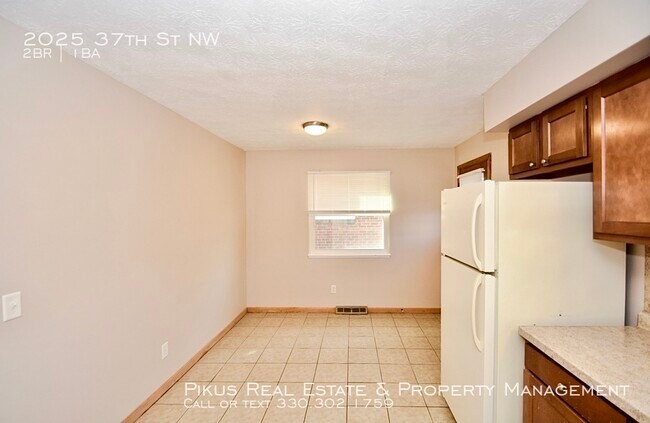 Building Photo - Welcome to 2025 37th St NW!
