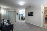 Located at 1501 Little Gloucester Rd in Blackwood, NJ, this single-floor, 3-bedroom, 1-bathroom home offers a well-organized layout across a comfortable footprint. The living room is a welcoming space with plush carpet flooring, neutral walls, and room for a full seating arrangement, with an open sightline toward the hallway leading to the bedrooms. Adjacent to the living area, the dining room features a window with natural light and a pendant light overhead, creating a pleasant space for meals. The galley-style kitchen is efficiently designed with wood-trimmed cabinetry, dark granite-style countertops, a gas range, and light hardwood-style flooring, providing generous counter and storage space along both sides. The primary bedroom is generously sized, carpeted, and features a window. The two additional bedrooms are also carpeted and offer comfortable dimensions with natural light. The full bathroom includes a tub-shower combination with tile surround, wood-style flooring, a dark-vanity with a granite-style countertop, and clean, modern finishes. Two hallways connect the space efficiently, and two closets—including a spacious walk-in—offer excellent storage with built-in shelving and hanging rods throughout.
