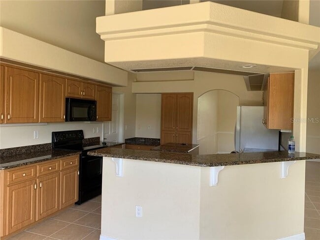 Building Photo - 13381 SW Pembroke Cir N