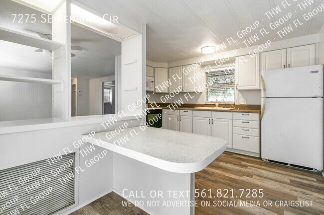 Building Photo - 7275 SE Redbird Cir