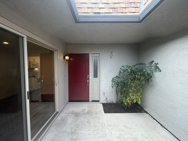 Building Photo - Move-In-Ready two-story townhome located o...