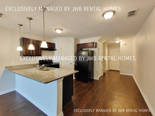 Foto del edificio - 8401 McGirts Village Ln
