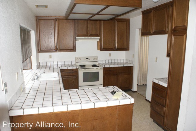 Building Photo - 4 br, 2 bath House - 3716 Black Feather Drive