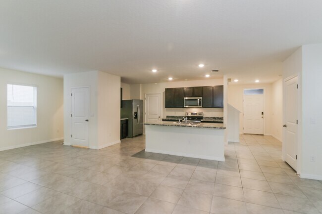 Foto del edificio - 7545 Cypress Walk Dr