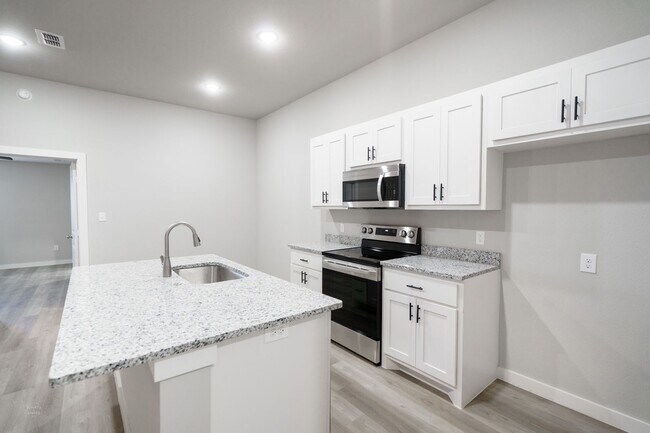 Foto del edificio - Brand-New Duplexes Near Stargate
