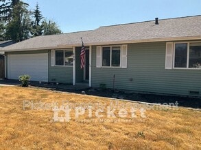 Building Photo - 609 NE Roswell Dr
