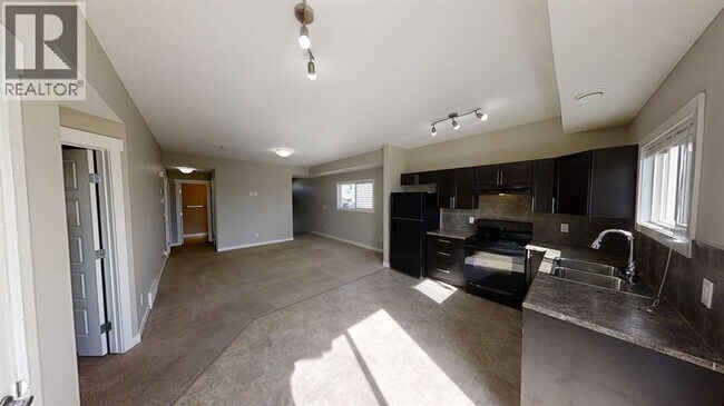 Photo du bâtiment - 8713-8788 88 St