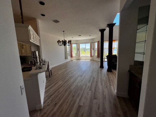 Building Photo - 3 Bedroom 2.5 Bath Cinnamon Bay Home with Stunning view, and Hardwood Flooring!