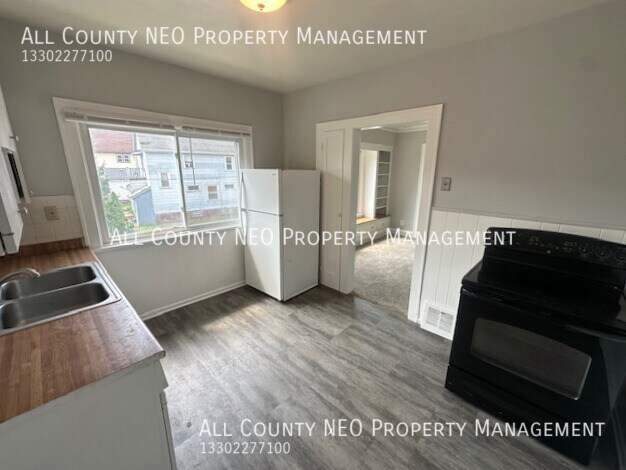 Building Photo - Bright 2-Bedroom with Covered Balcony and ...