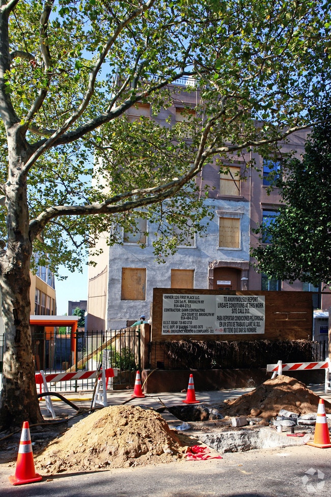 Building Photo - 126 1st Pl