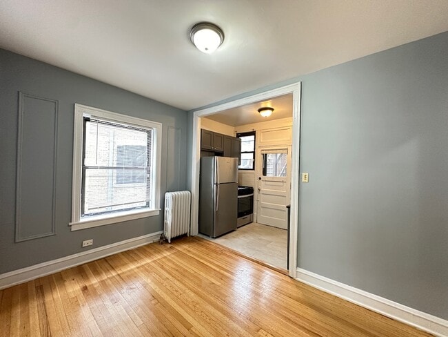 Building Photo - 1321.5 W Estes Ave