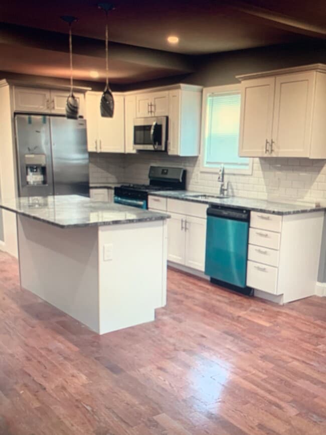 Kitchen w/ appliances - 713 N Montello St
