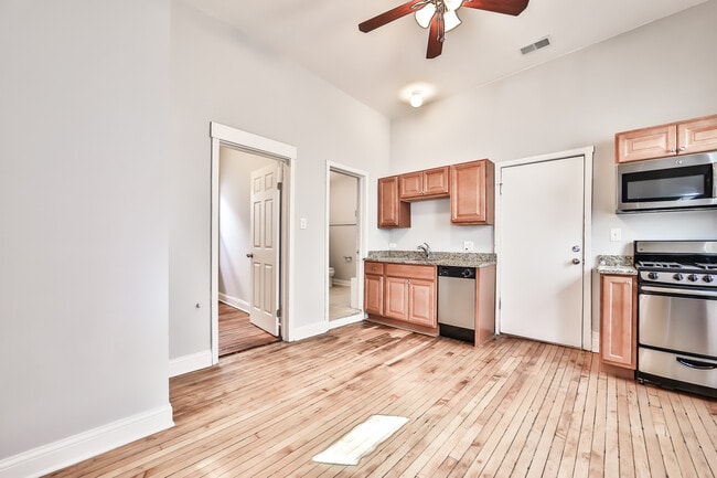 Kitchen has granite and ss appliances - 1702 N Campbell Ave
