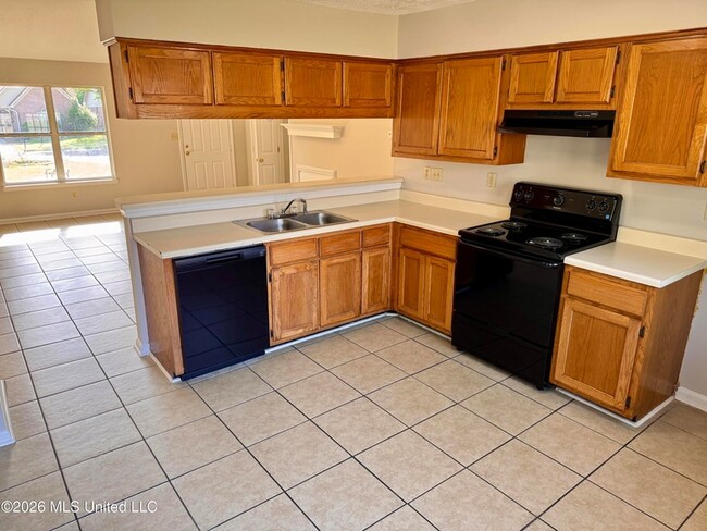 Foto del edificio - 7011 Hampton Dr