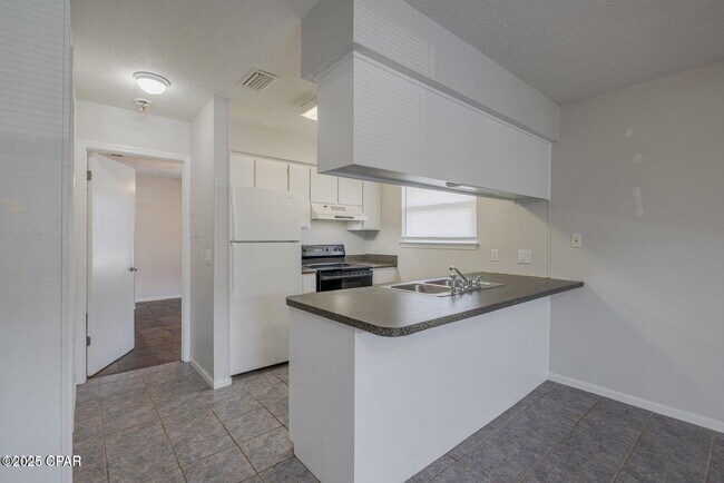 Foto del edificio - 7813 N Lagoon Dr