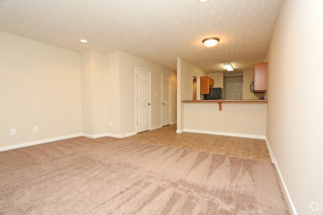 01 2BR, 1.5BA - 1,000 SF - Townhome With Garage - Living Room - Upper and Lower Stone Apartments