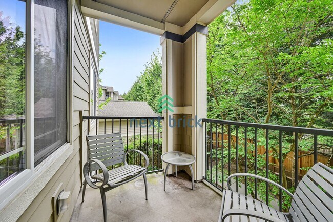 Building Photo - Rare Ground-Floor, End Unit with massive b...
